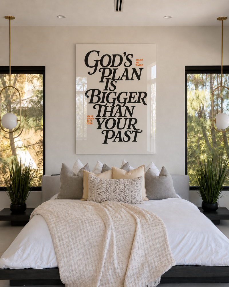 God's Plan Is Bigger Than Your Past acrylic glass piece above a bed
