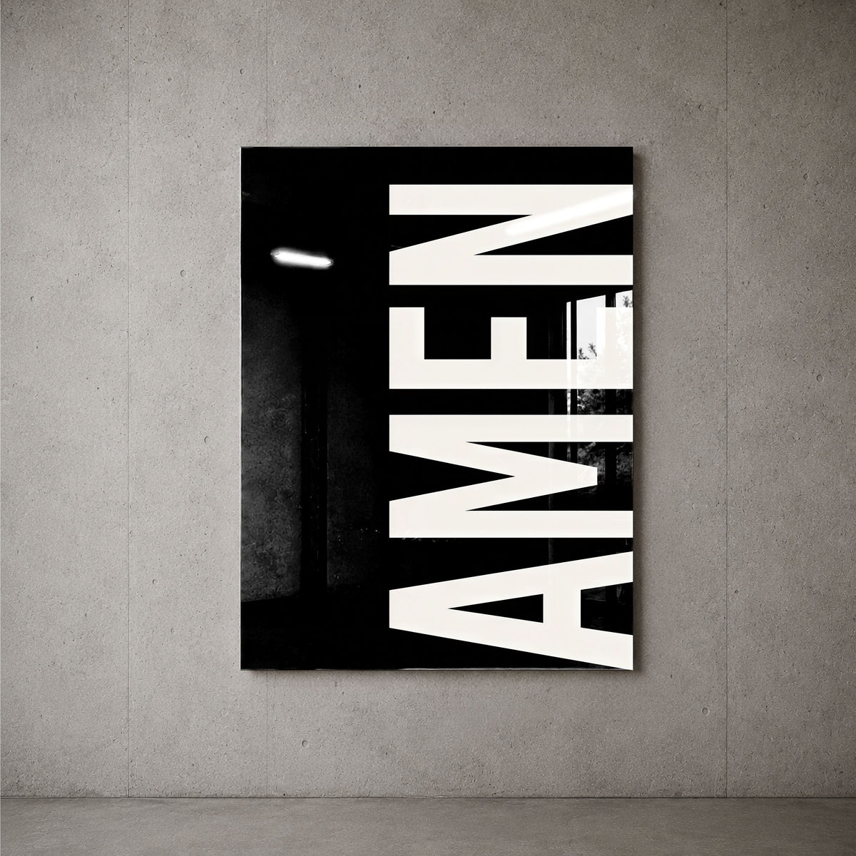 AMEN black acrylic wall art — concrete wall