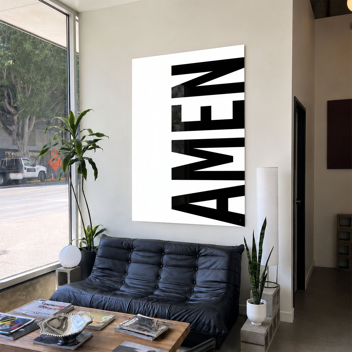 AMEN white acrylic wall art — black sofa