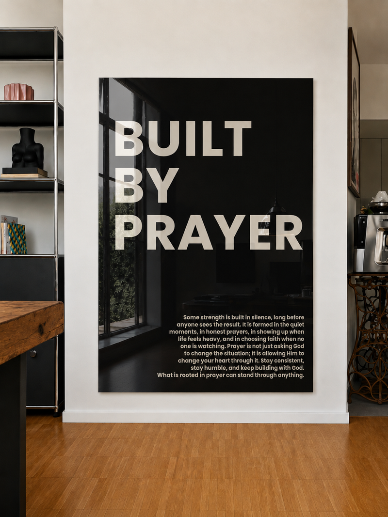 Built by Prayer acrylic wall art displayed in a modern interior