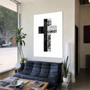 Cross-All Things acrylic wall art above a black sofa