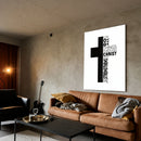 Cross-All Things acrylic wall art above a brown sofa