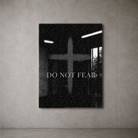 Do Not Fear Cross acrylic wall art on a concrete wall