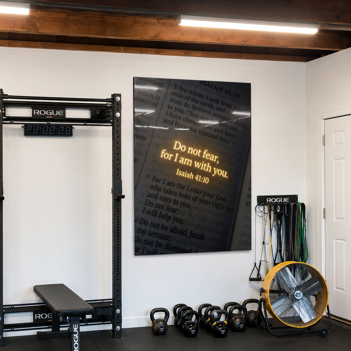 Do Not Fear acrylic wall art displayed in a home gym