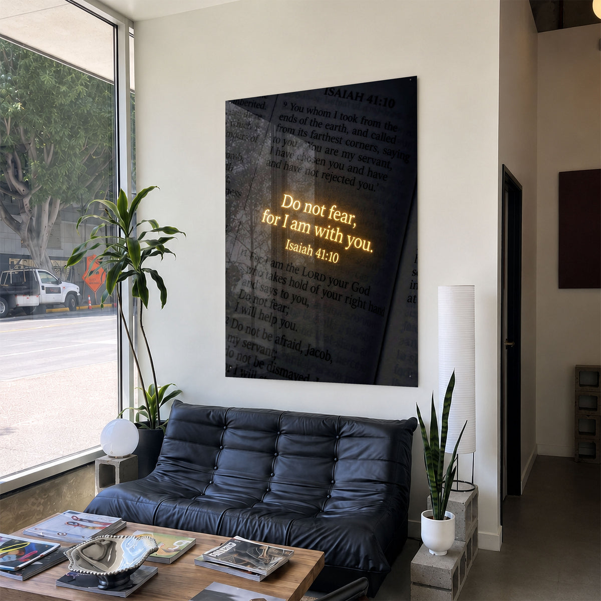 Do Not Fear acrylic wall art displayed above a black sofa