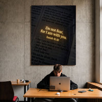 Do Not Fear acrylic wall art displayed above a workspace
