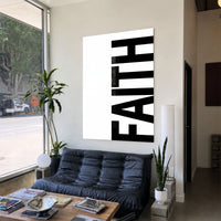 Faith white acrylic wall art — black sofa