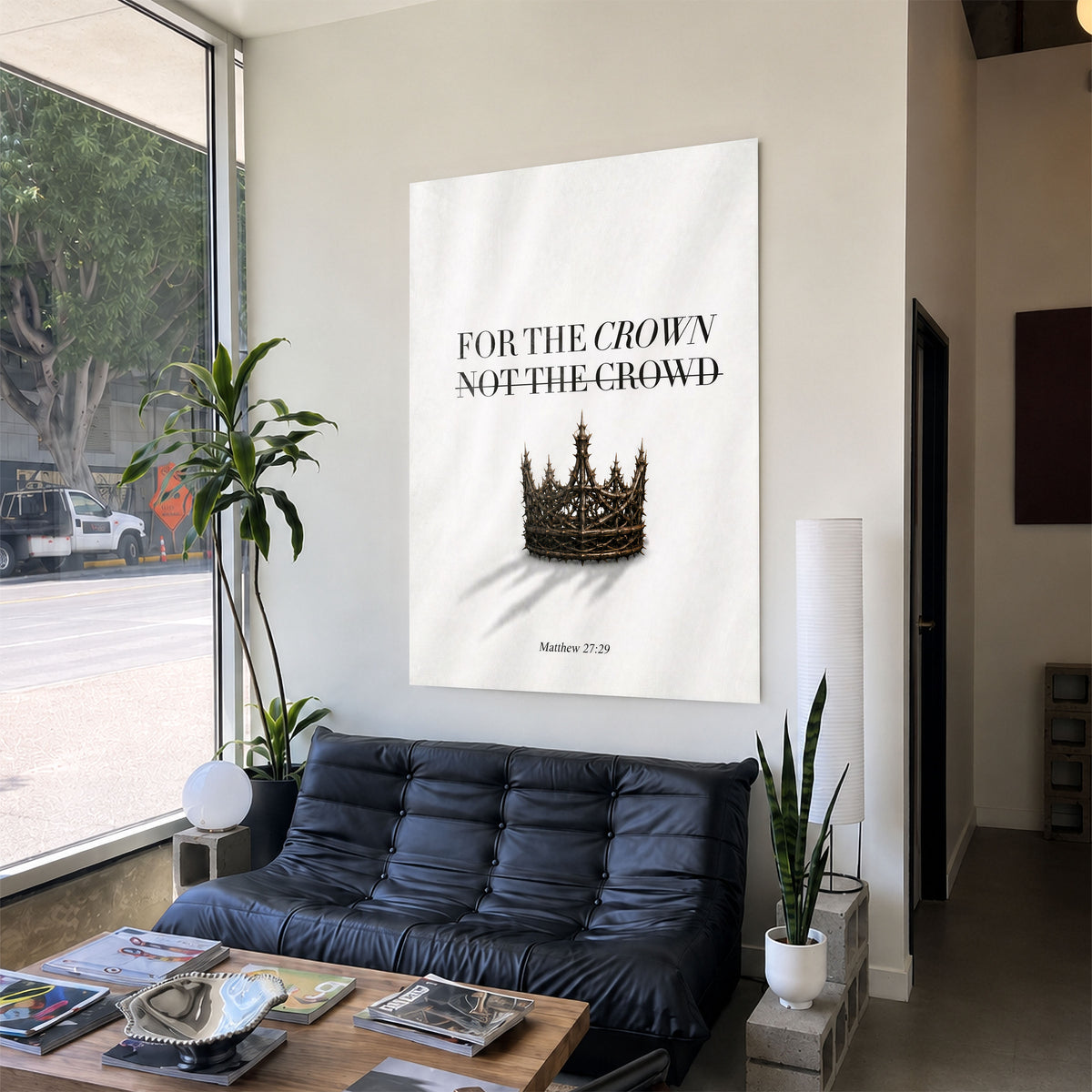 For The Crown acrylic wall art above a black sofa
