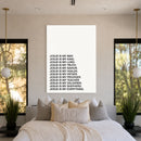 Jesus Is acrylic wall art displayed above a bed