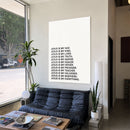 Jesus Is acrylic wall art displayed in a modern living room