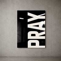 Pray black acrylic wall art — concrete wall