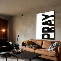 Pray white acrylic wall art — brown sofa