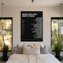 What You Can Give To God acrylic wall art displayed above a bed