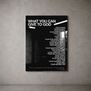 What You Can Give To God black acrylic wall art on a concrete gallery wall